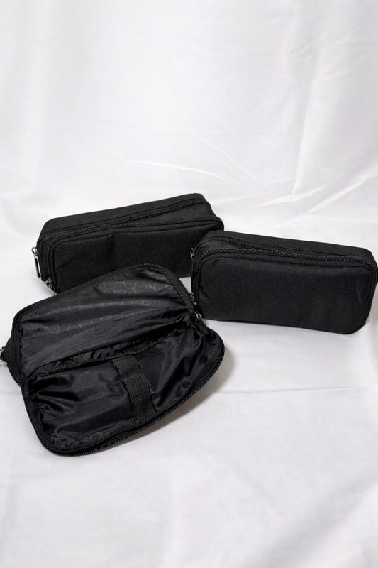 Black multi-compartment zip organiser cases