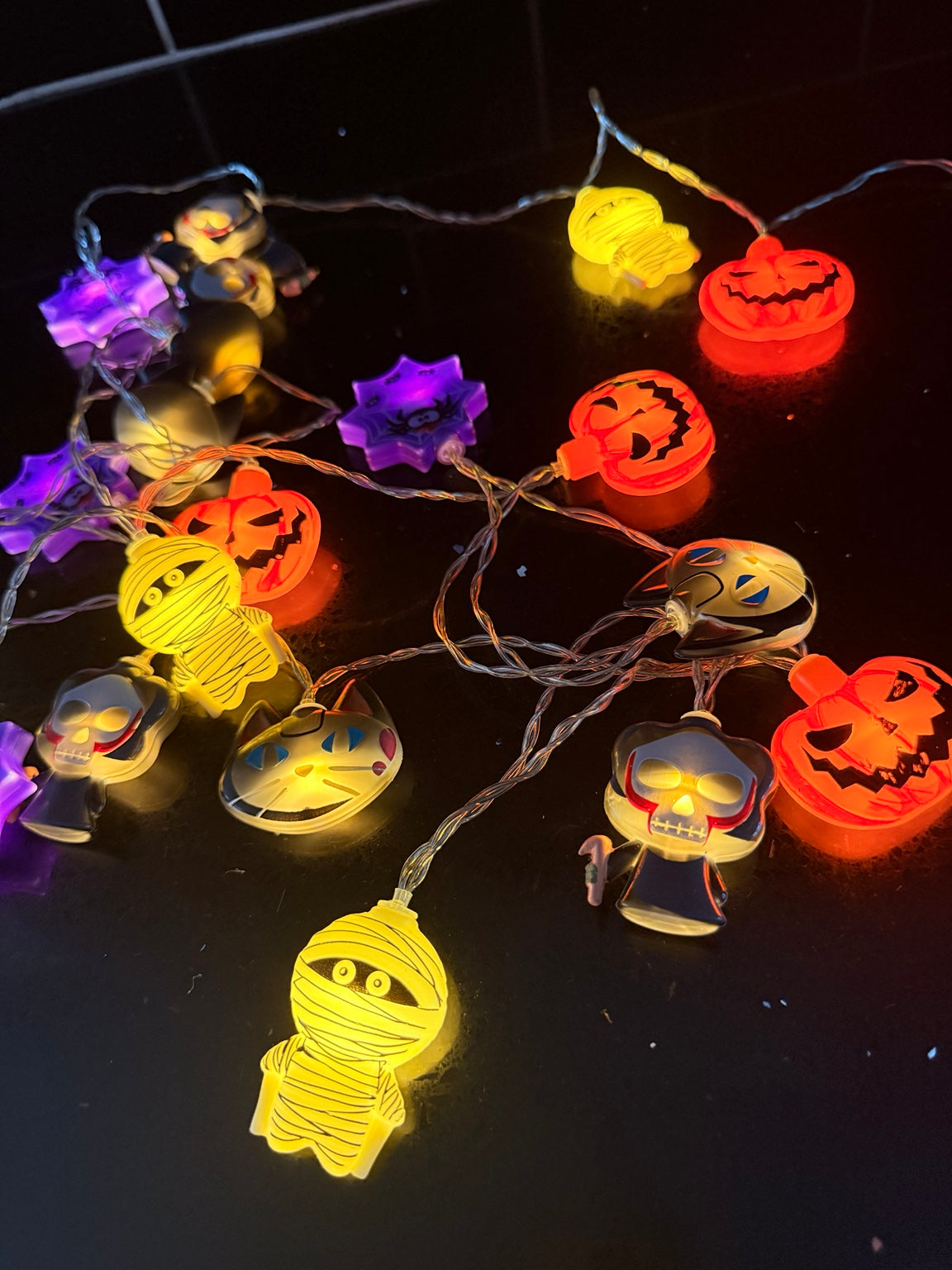Halloween multicolour character string lights lit up