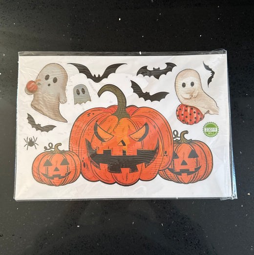 Halloween sticker sheet featuring a large pumpkin, ghosts and bats