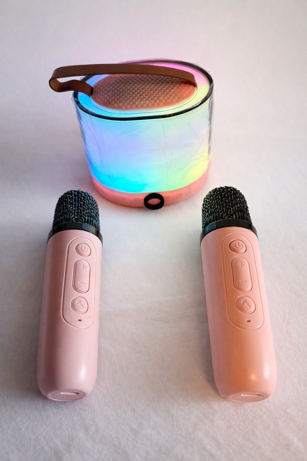K52 portable speaker with two pink microphones and colour lighting